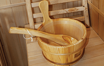 Traditional wooden bucket and ladle